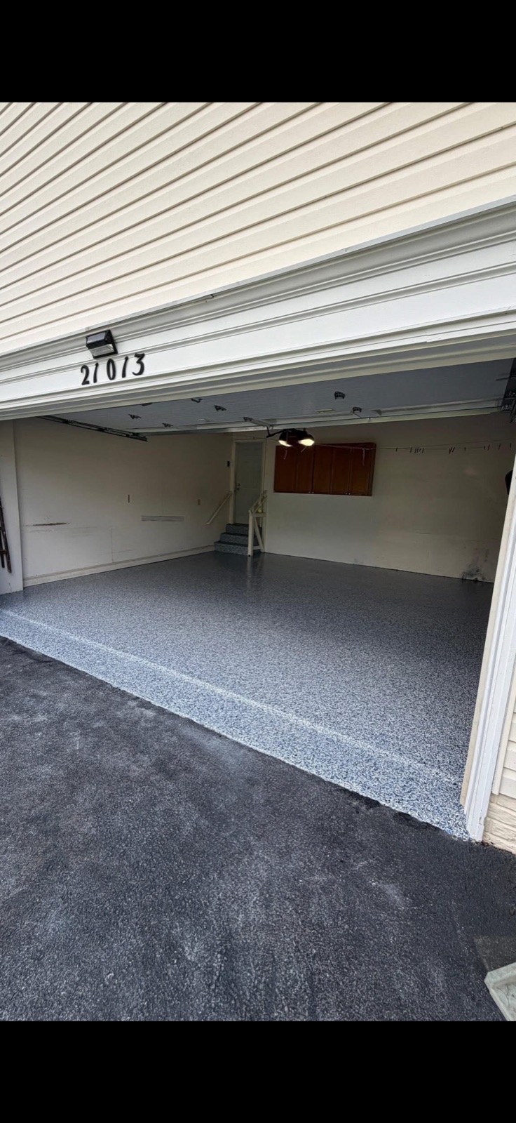 After: garage with new epoxy flake floor coating installed by 5 Star Pros, DMV