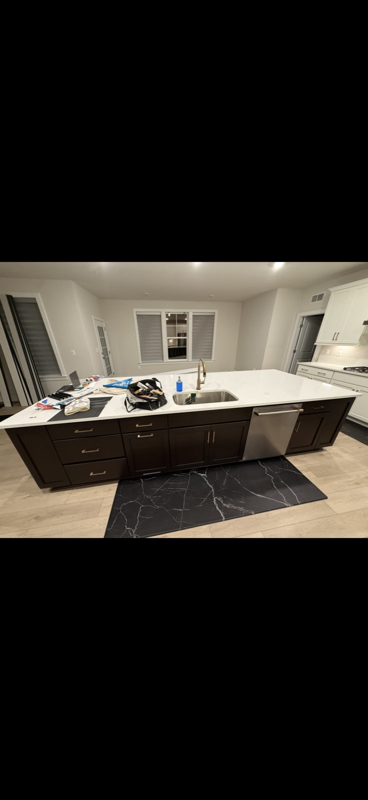 Kitchen island installation with dark wood cabinets and quartz countertop, 5 Star Pros, DMV