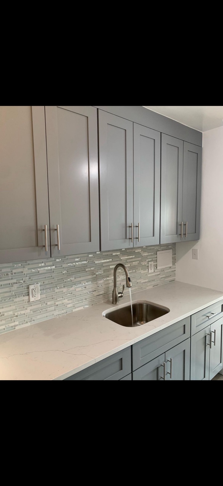 Kitchen remodel with gray shaker cabinets and glass tile backsplash, 5 Star Pros, DMV