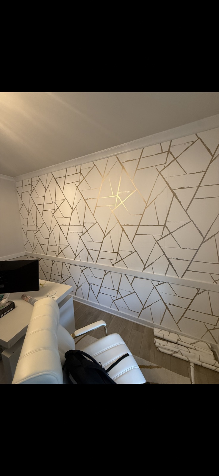 After: geometric gold wallpaper installed in living room by 5 Star Pros, DMV