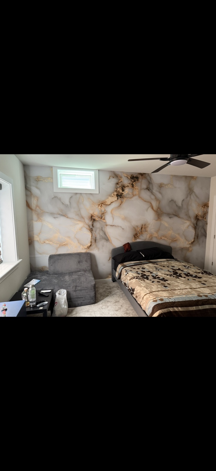 After: marble-print accent wall wallpaper installed in bedroom by 5 Star Pros, DMV
